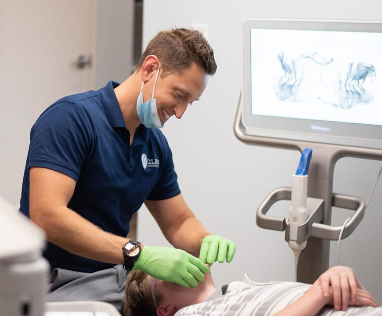 Dr-Glass-Checking-Patients-Teeth