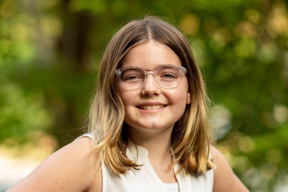 Young patient smiling after myofunctional therapy treatment in Chesapeake VA orthodontic office serving Elizabeth City NC and Moyock NC