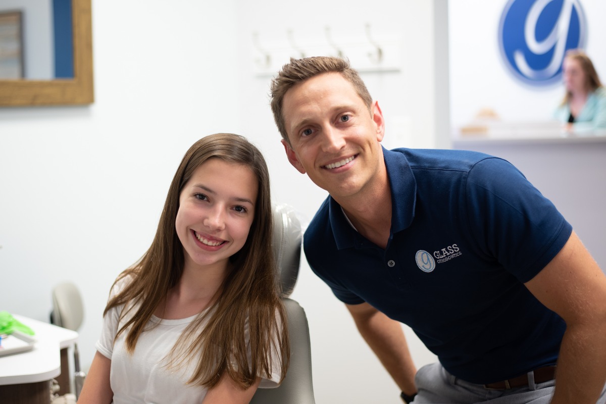 Orthodontist with patient in Chesapeake VA orthodontic office serving Elizabeth City NC and Moyock NC for braces and Invisalign care