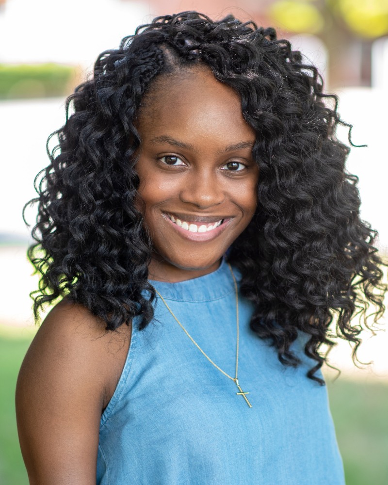 Teen patient smiling with healthy straight teeth after orthodontic treatment Chesapeake VA